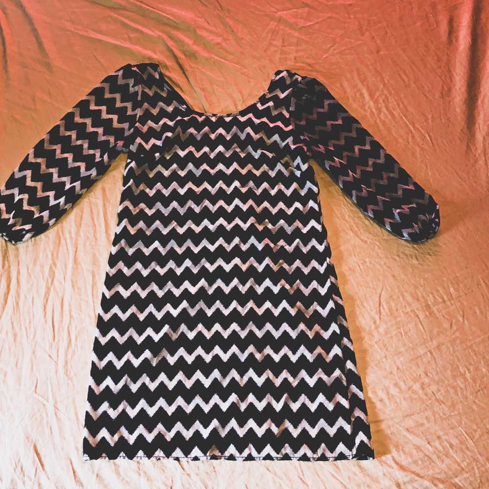 Black and off white dress with gold zipper in back
